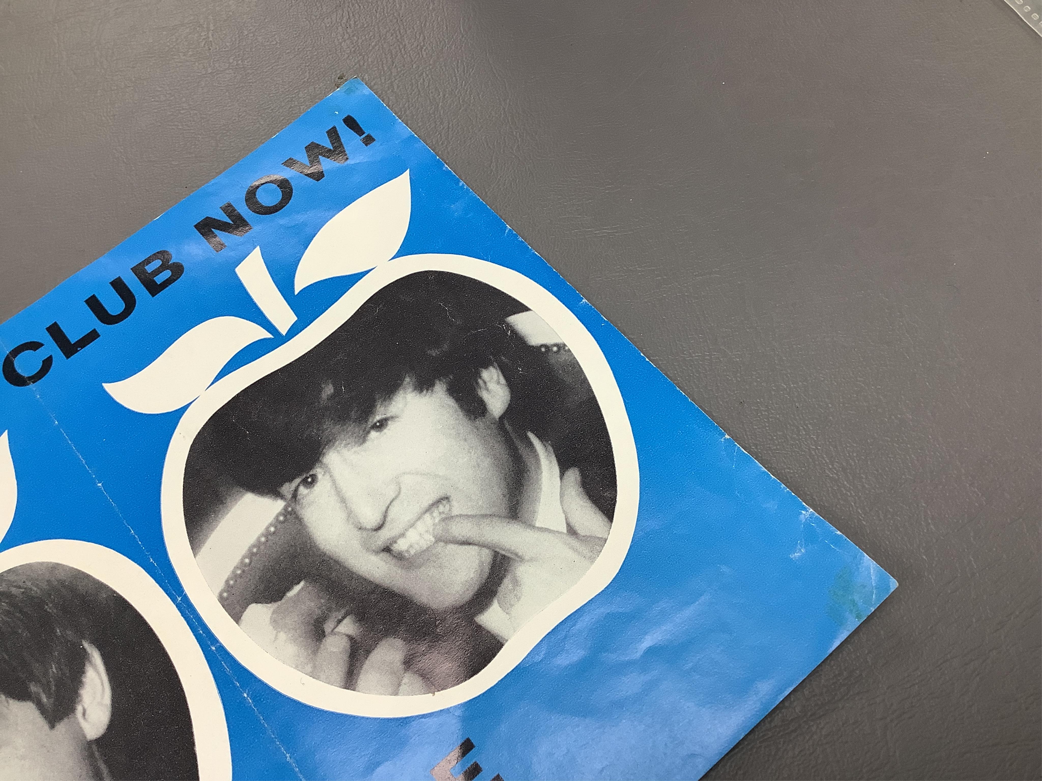 An original 1967 poster promoting the Beatles eating apples as part of the British Council of Dentistry's campaign, reads; ‘Look who's joined the apple club now', on a blue ground, 43 x 18cm